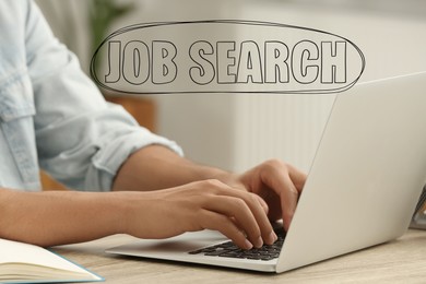 Image of Job search. Woman using laptop at table, closeup