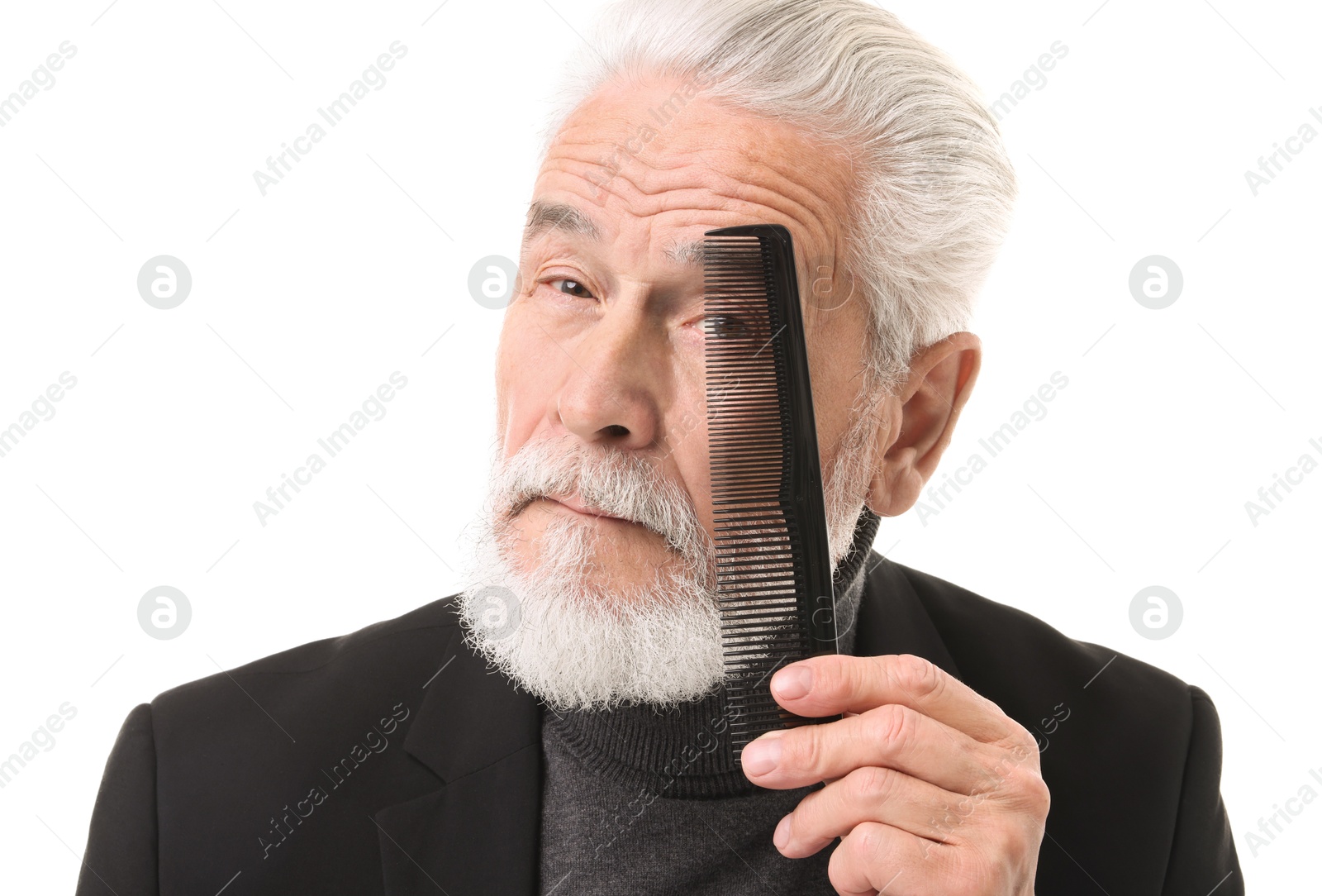 Photo of Bearded senior man with comb on white background