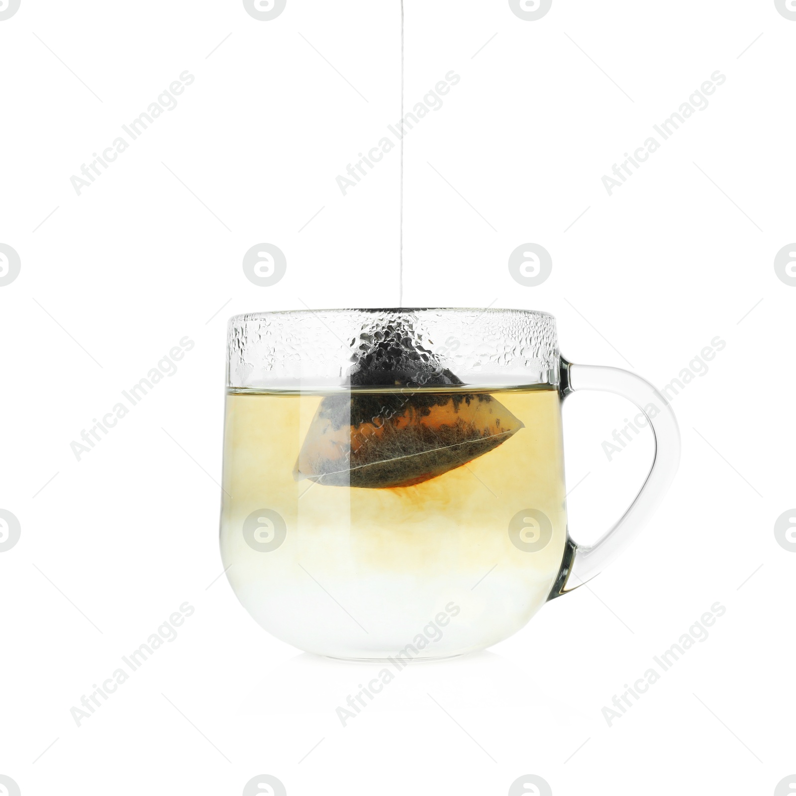 Photo of Cup with tea bag isolated on white