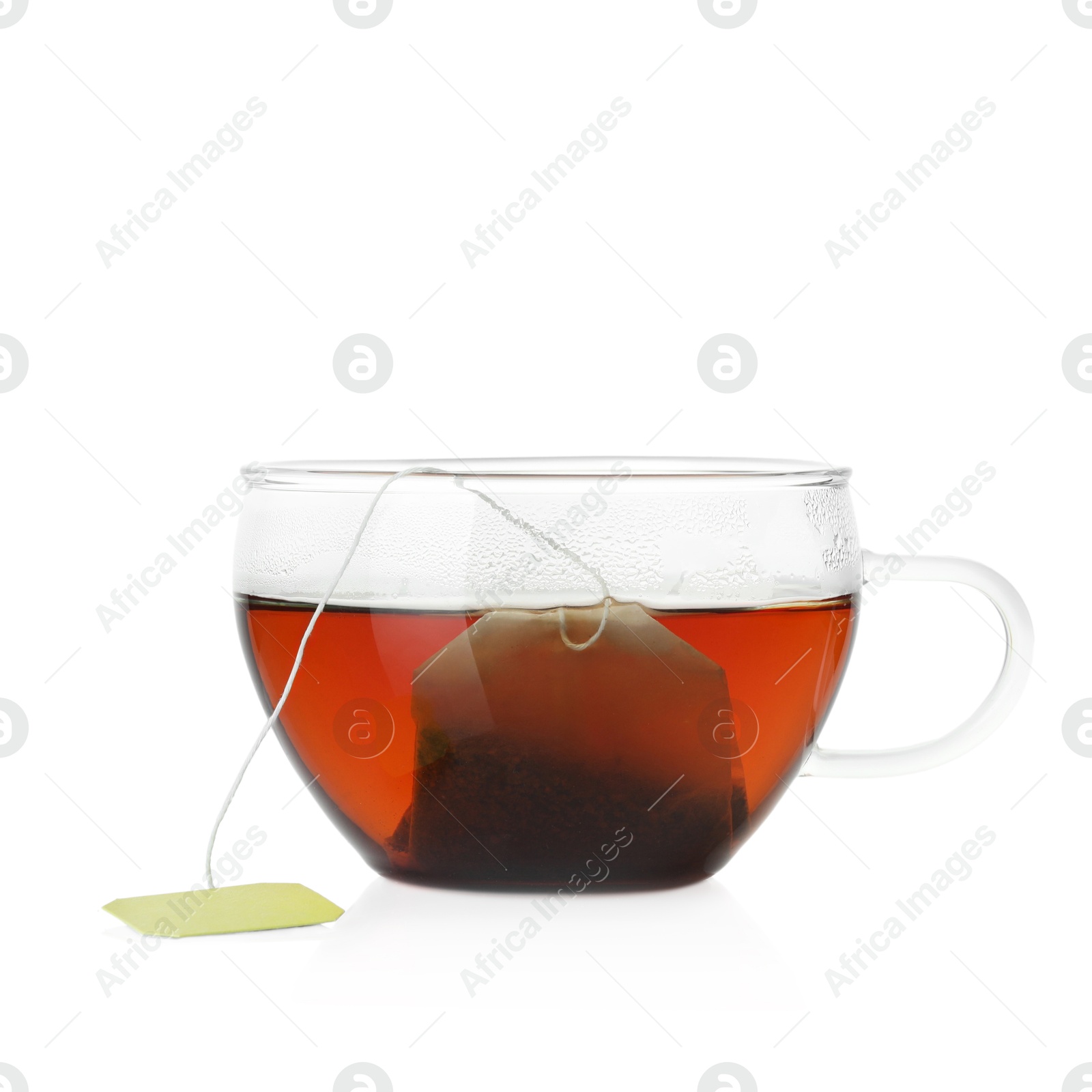 Photo of Cup with tea bag isolated on white