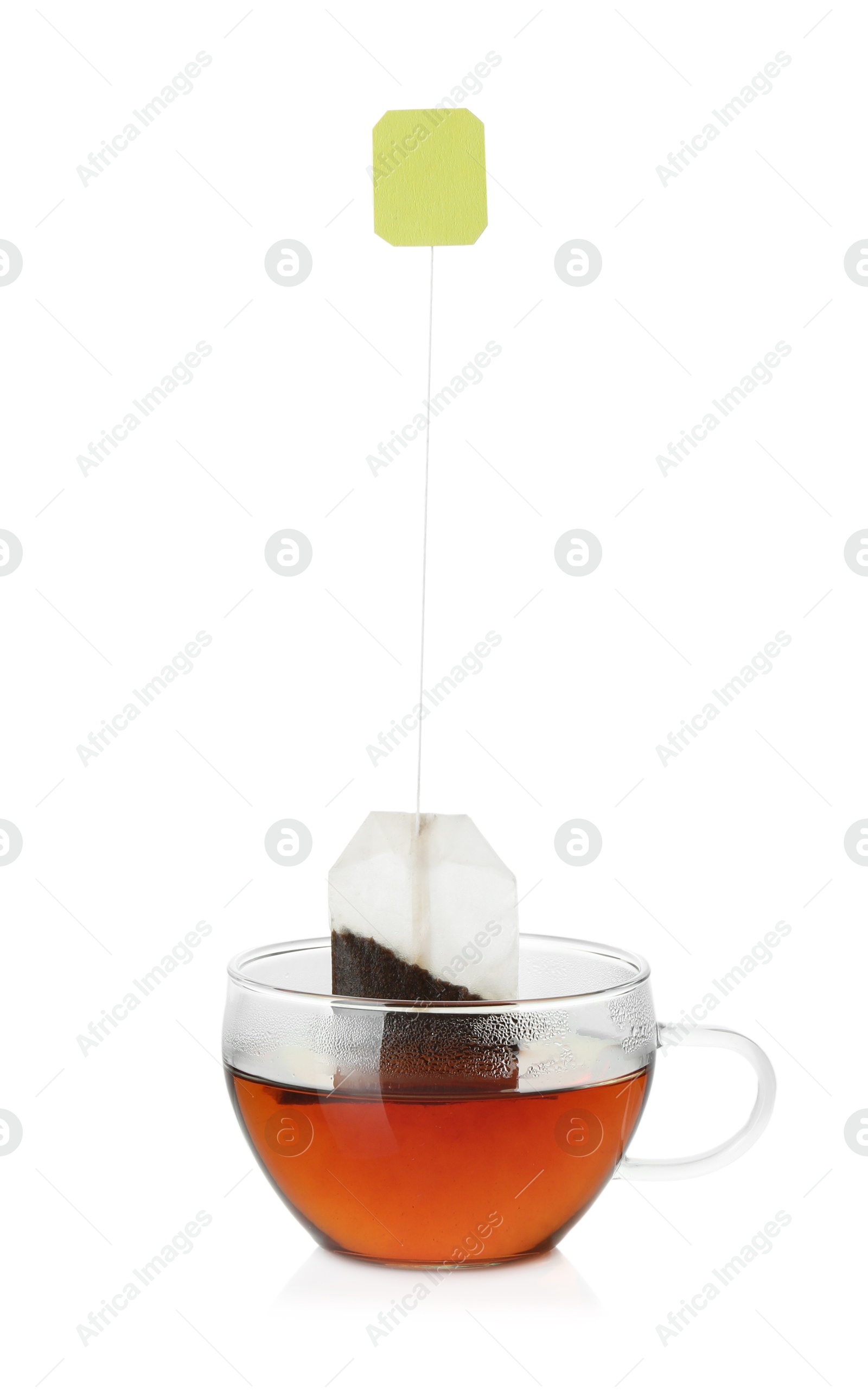 Photo of Cup with tea bag isolated on white