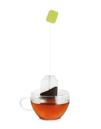 Photo of Cup with tea bag isolated on white