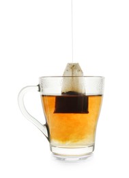 Photo of Cup with teabag isolated on white. Brewing aromatic tea