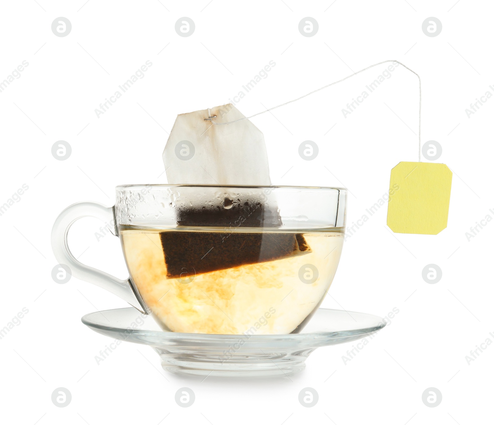 Photo of Brewing aromatic tea. Cup with teabag isolated on white