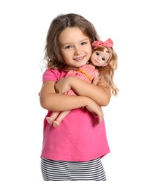 Photo of Cute little girl holding doll on white background