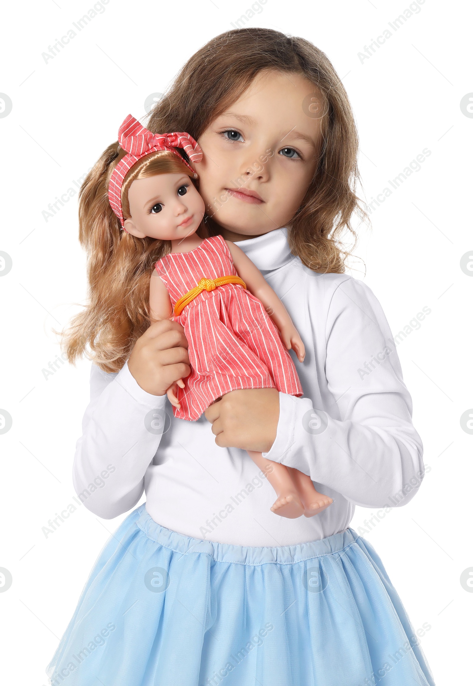 Photo of Cute little girl with doll on white background