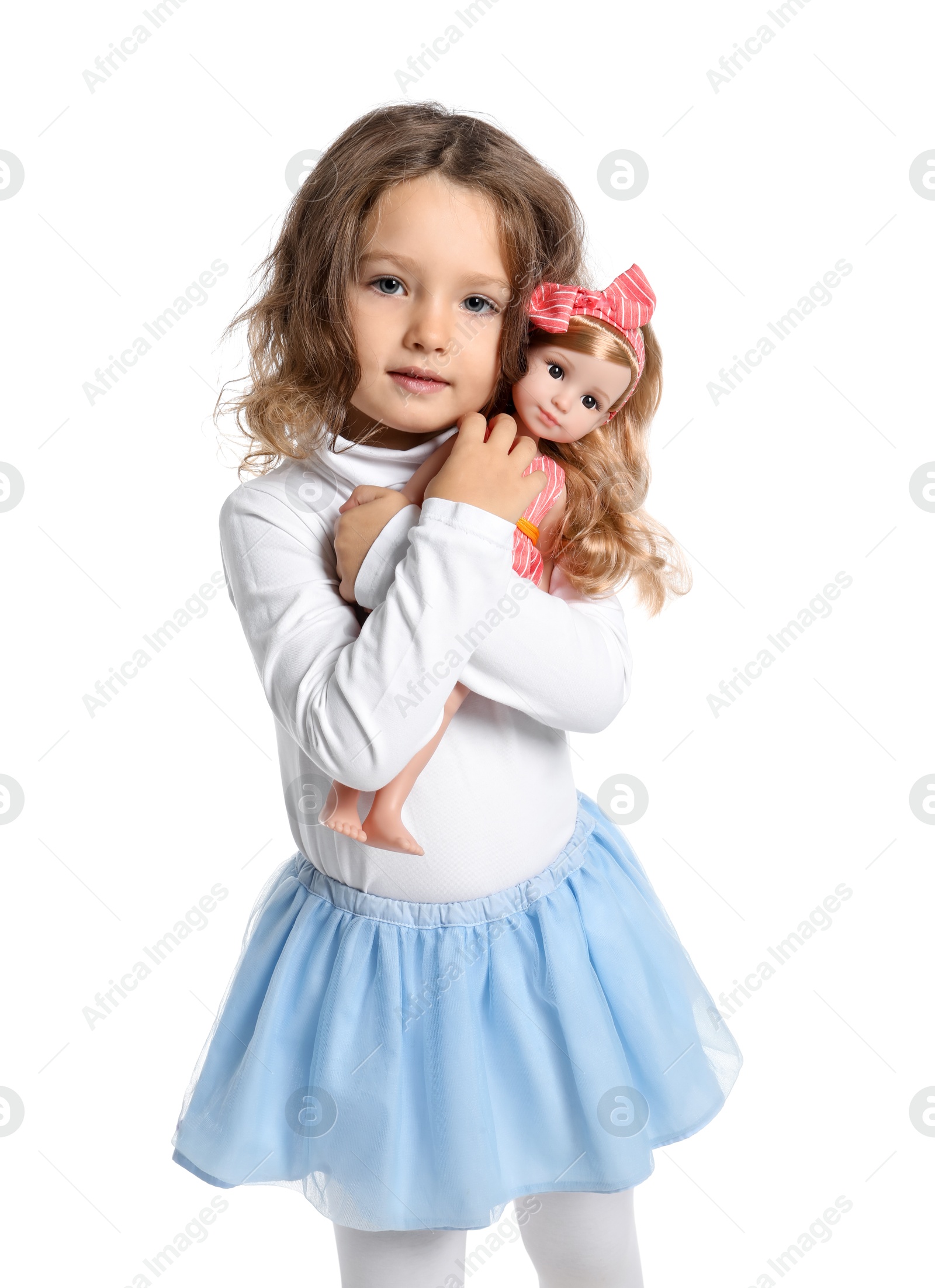 Photo of Cute little girl with doll on white background