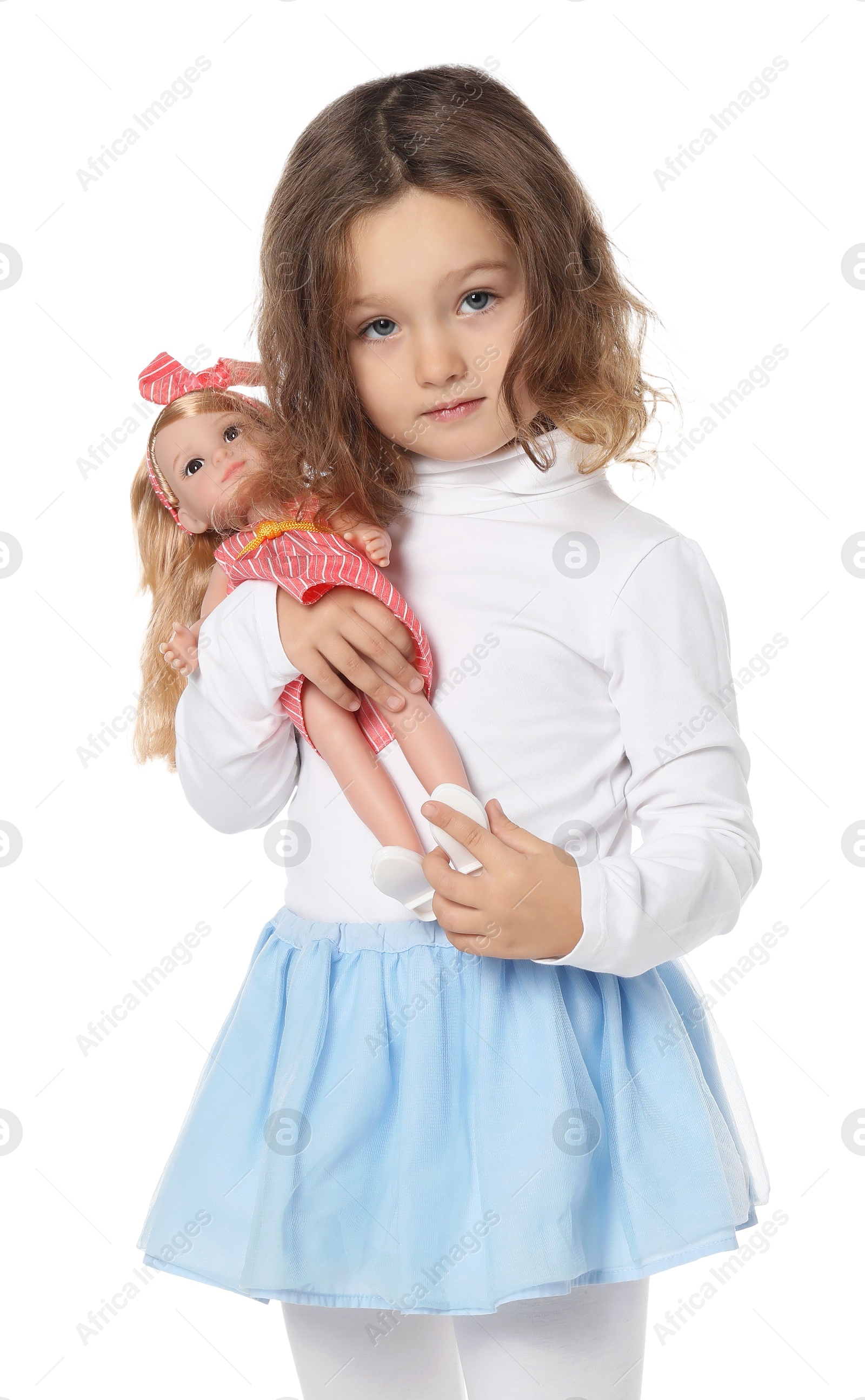 Photo of Cute little girl with doll on white background