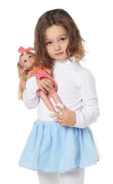 Photo of Cute little girl with doll on white background