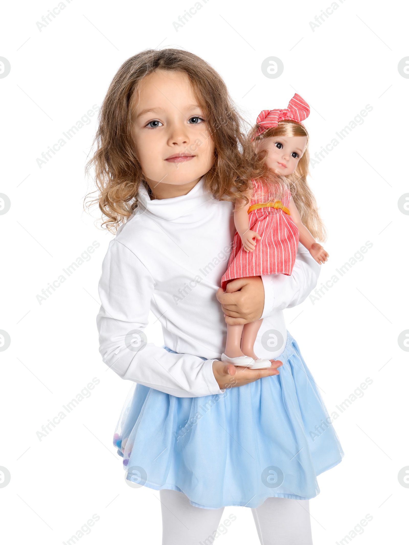 Photo of Cute little girl with doll on white background