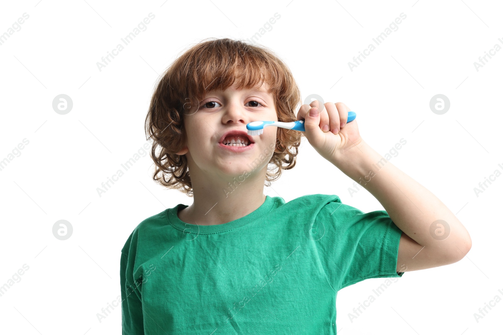 Photo of Cute boy brushing his teeth on white background