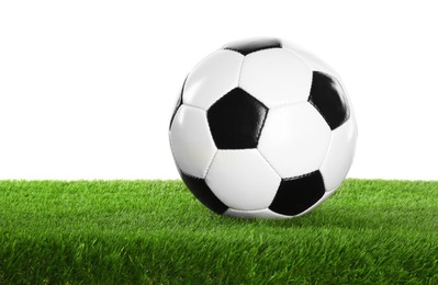 Photo of Soccer ball on artificial grass isolated on white. Sport equipment