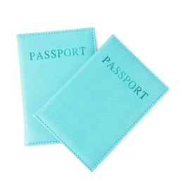 Photo of Passports in bright covers isolated on white, top view