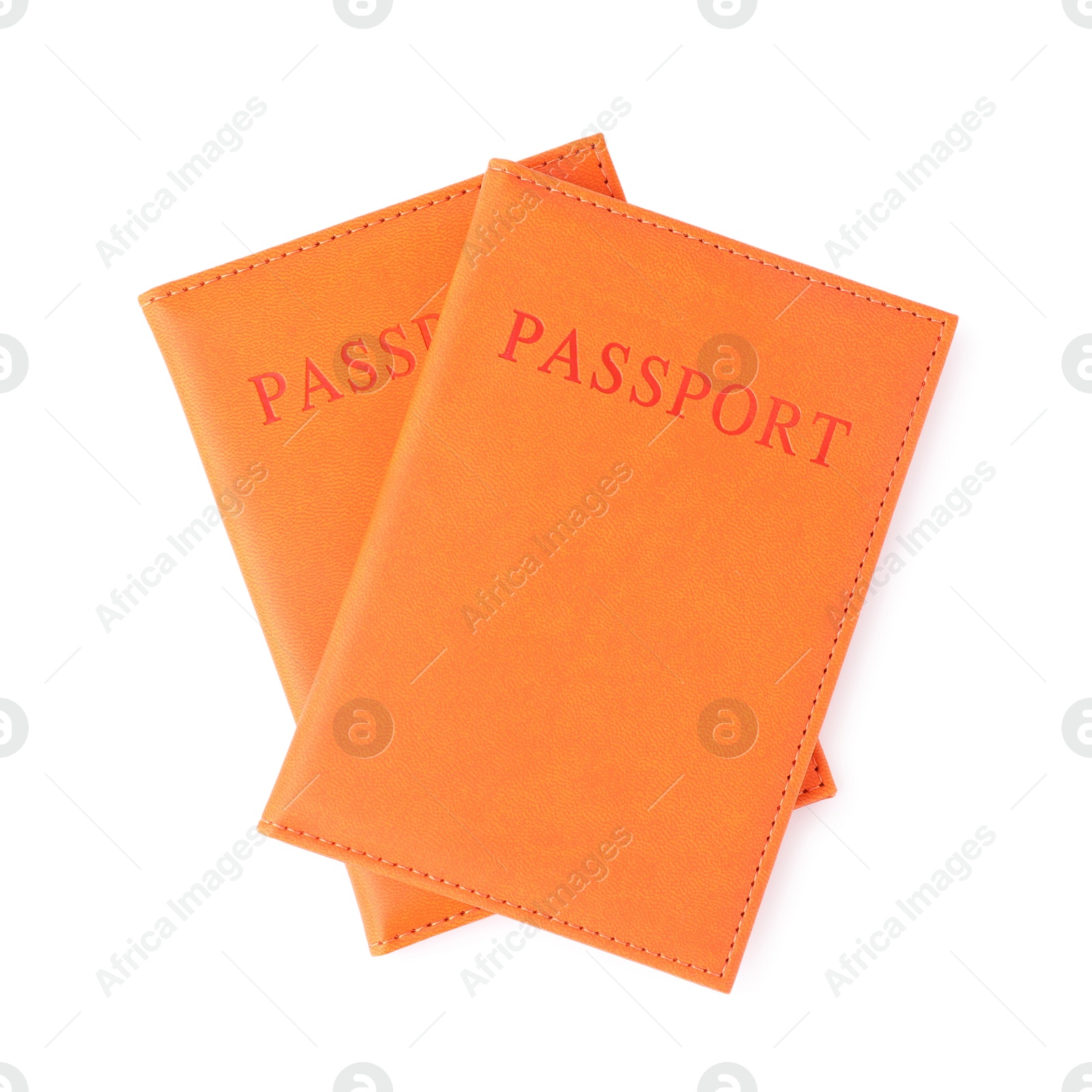 Photo of Passports in bright covers isolated on white, top view