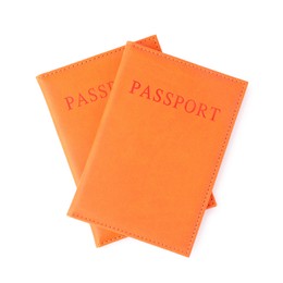 Photo of Passports in bright covers isolated on white, top view