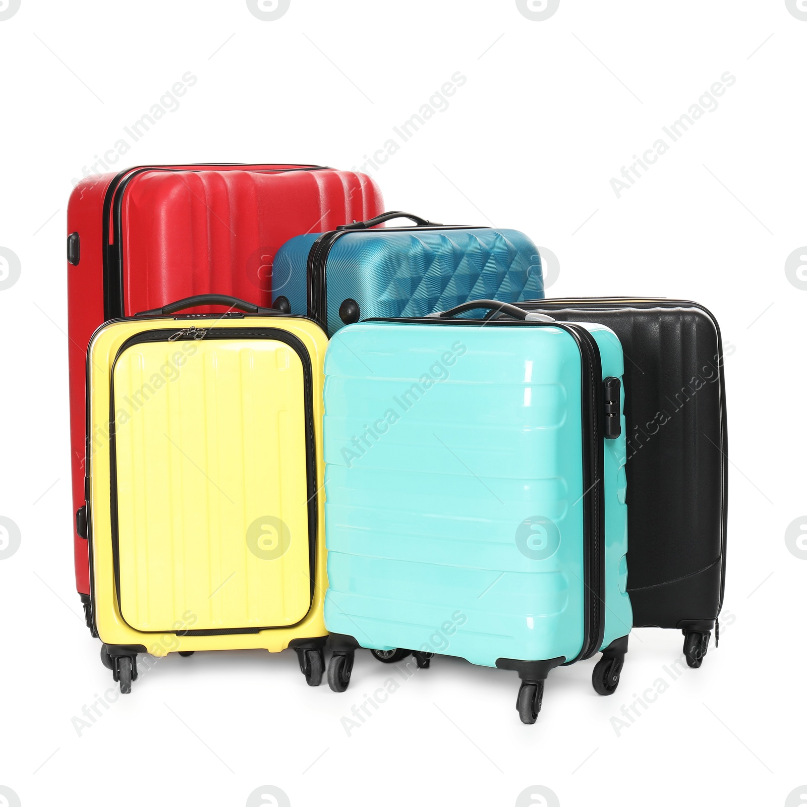 Photo of Many closed colorful suitcases isolated on white