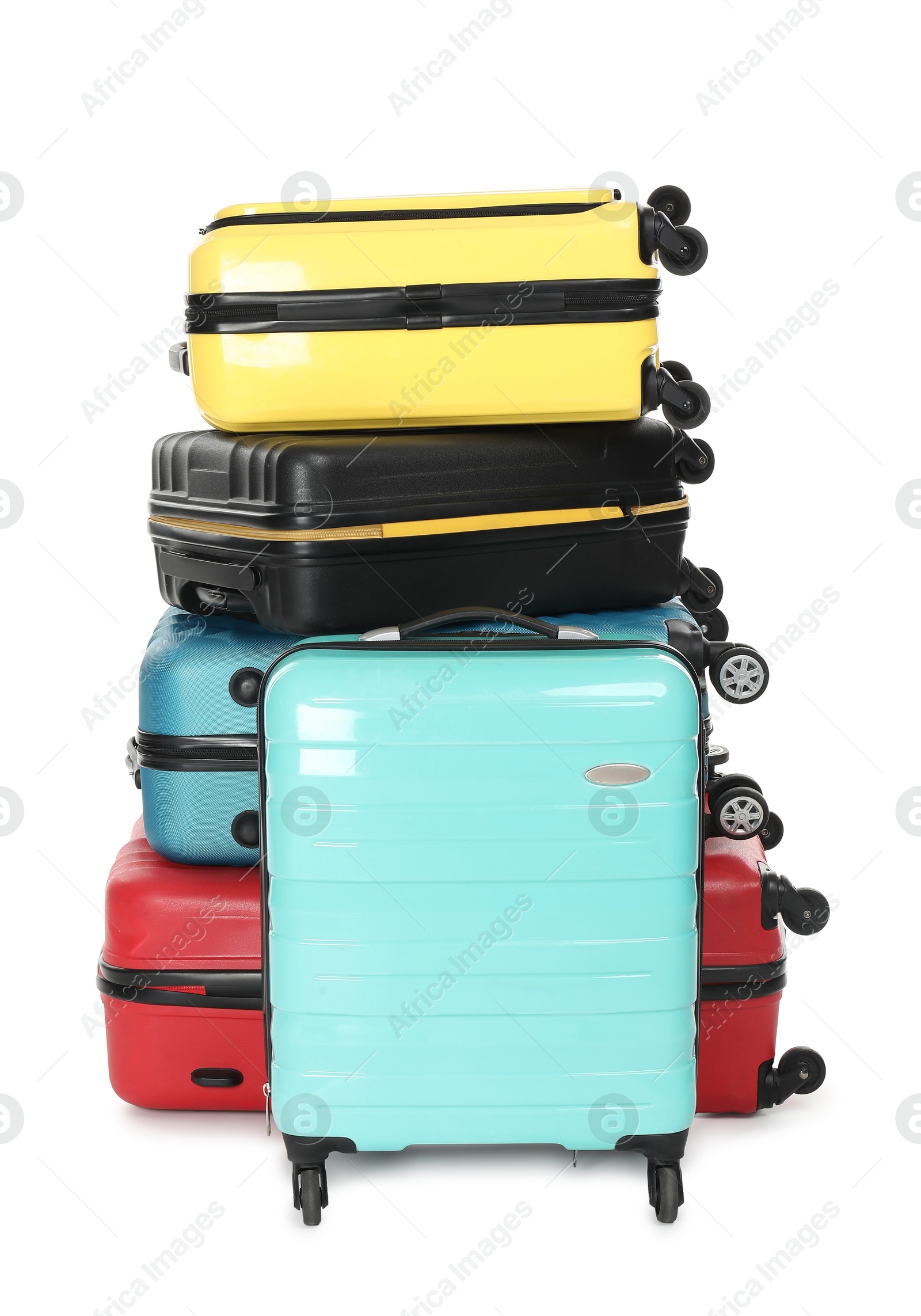 Photo of Stack of colorful suitcases isolated on white