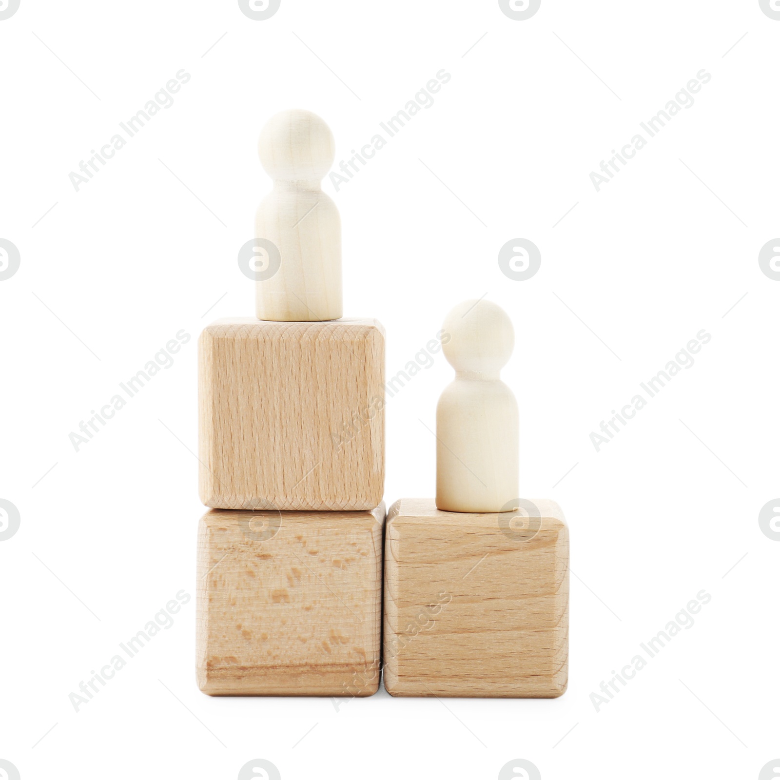 Photo of Human figures on wooden blocks against white background. Competition concept