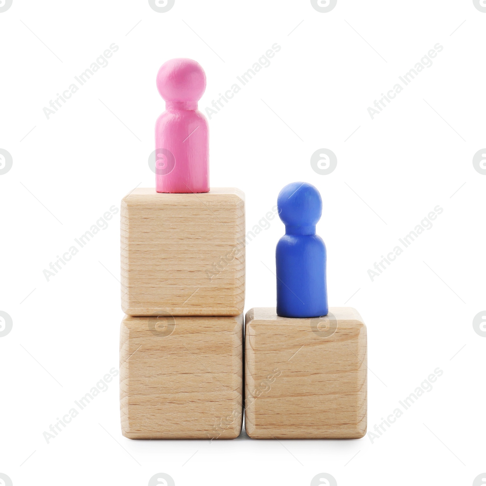 Photo of Human figures on wooden blocks, pink one on top against white background. Competition concept