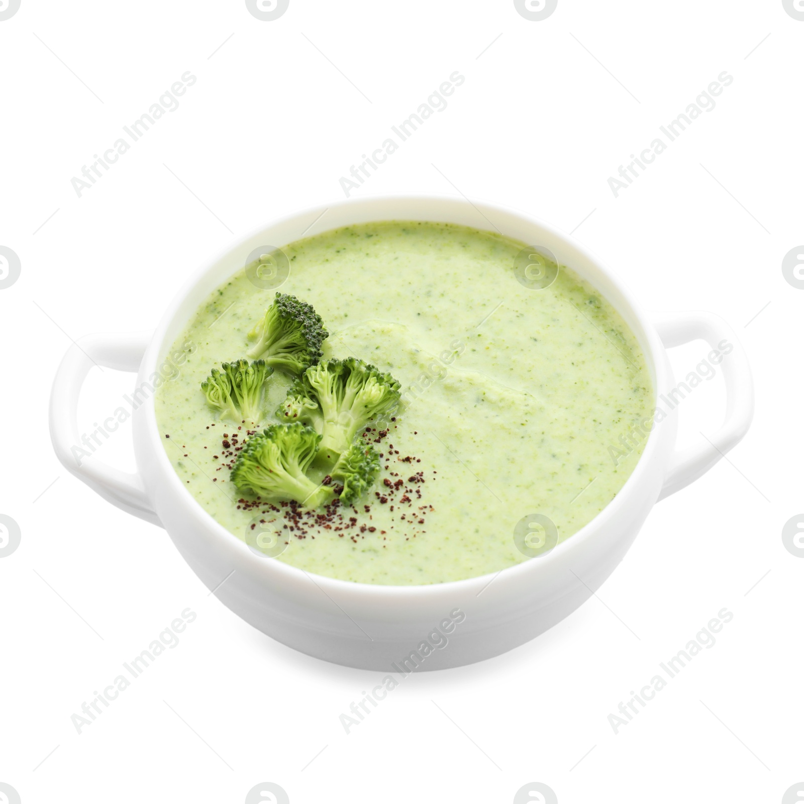 Photo of Delicious broccoli cream soup in bowl isolated on white