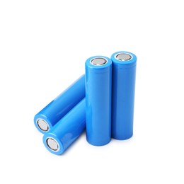 Photo of Many AA cell batteries isolated on white