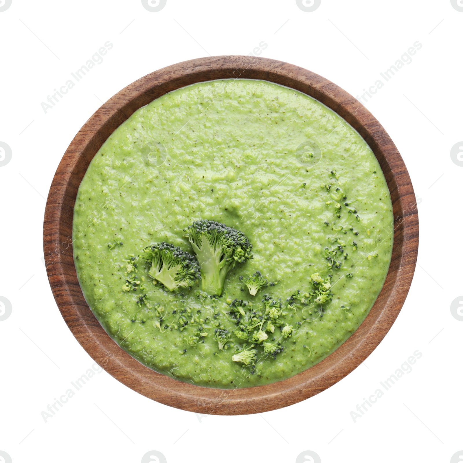 Photo of Delicious broccoli cream soup in bowl isolated on white, top view