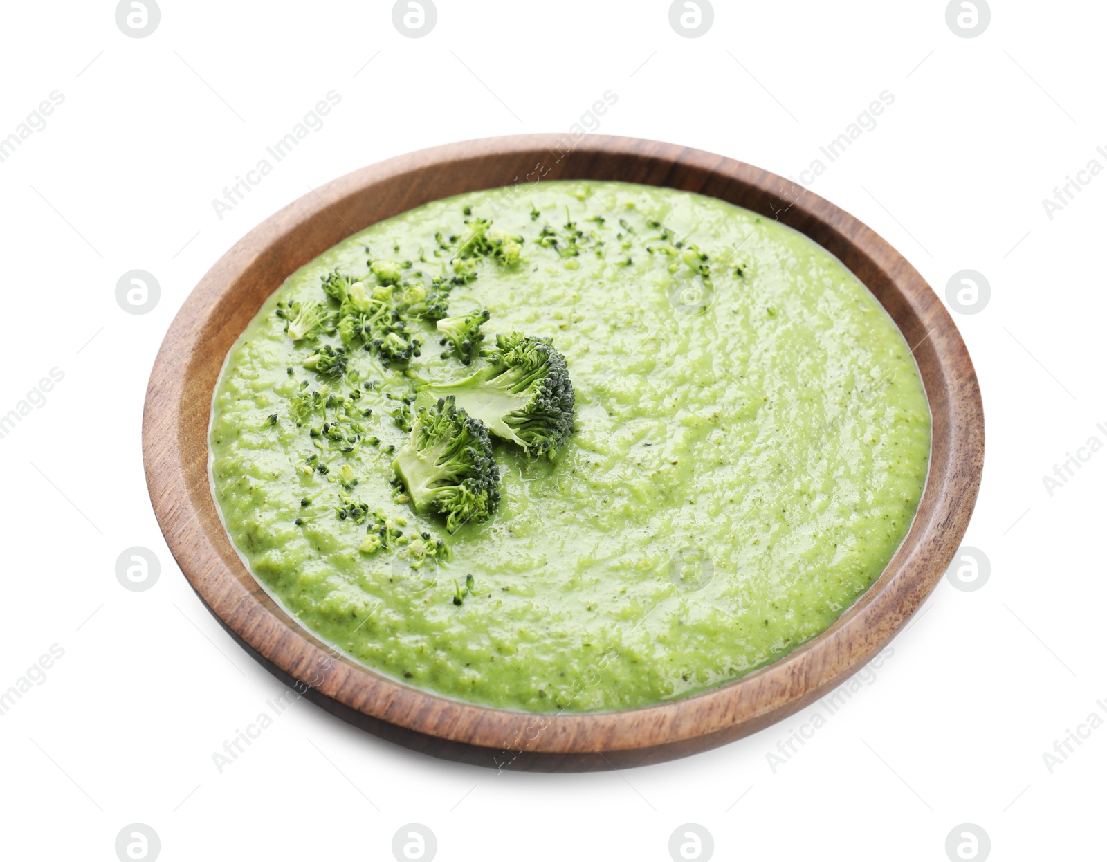 Photo of Delicious broccoli cream soup in bowl isolated on white