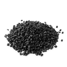 Photo of Pile of black plastic granules isolated on white