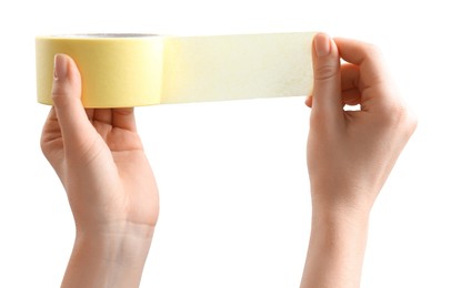 Photo of Woman with roll of masking tape on white background, closeup