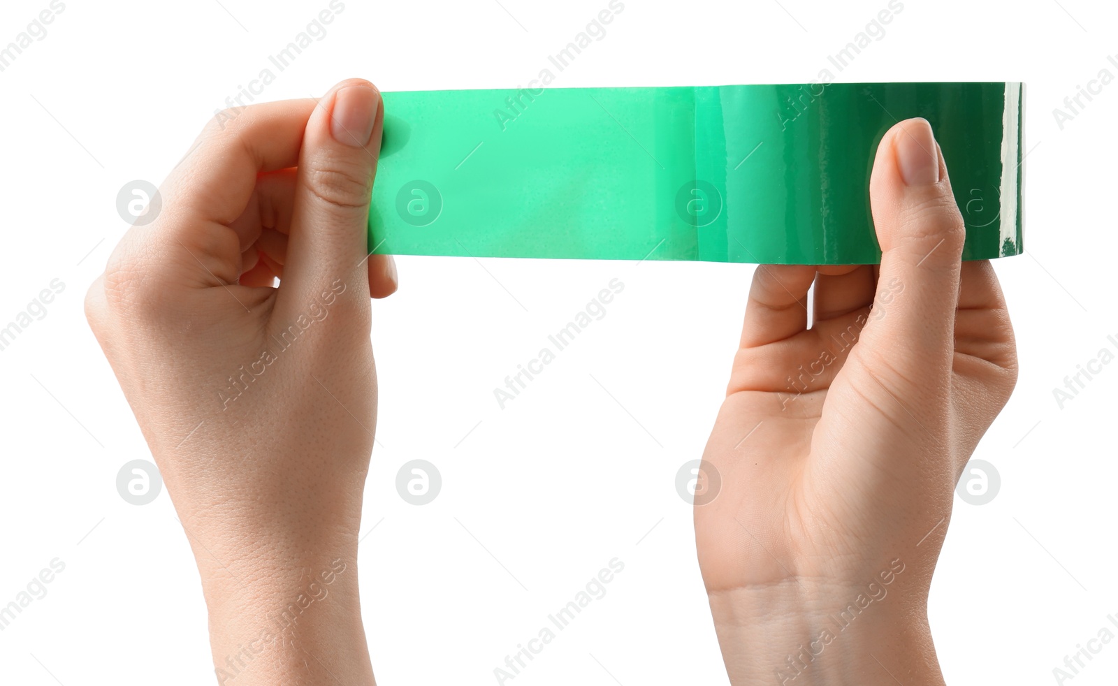 Photo of Woman with roll of green adhesive tape on white background, closeup