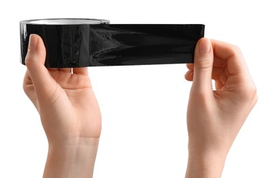 Woman with roll of black adhesive tape on white background, closeup