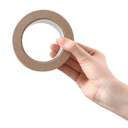 Photo of Woman with roll of masking tape on white background, closeup