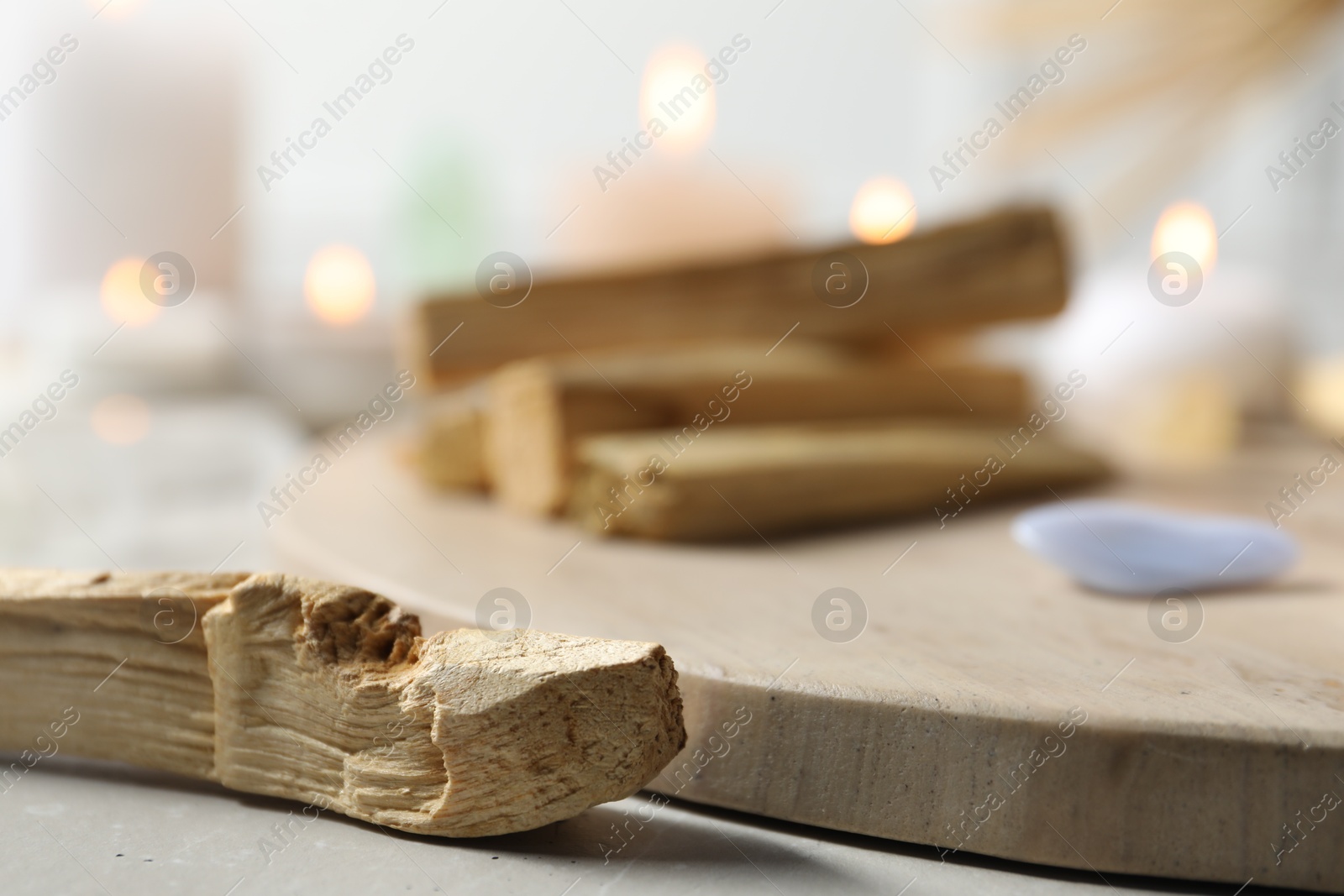 Photo of Palo santo wood sticks on table, closeup