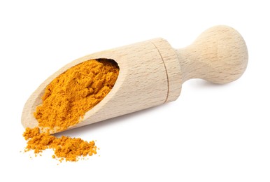 Photo of Turmeric powder in wooden scoop isolated on white