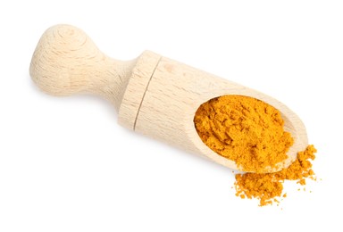 Photo of Turmeric powder in wooden scoop isolated on white, top view