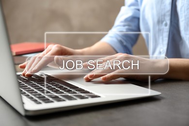 Job Search. Woman using laptop at table, closeup