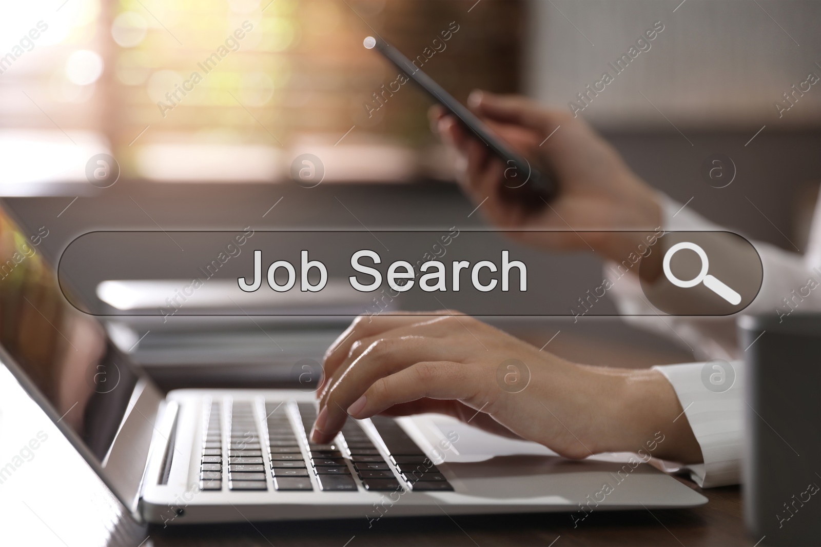 Image of Job Search. Woman with laptop and mobile phone at table, closeup. Search bar with words