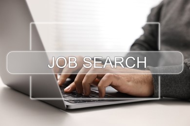 Image of Job Search. Man using laptop at table, closeup