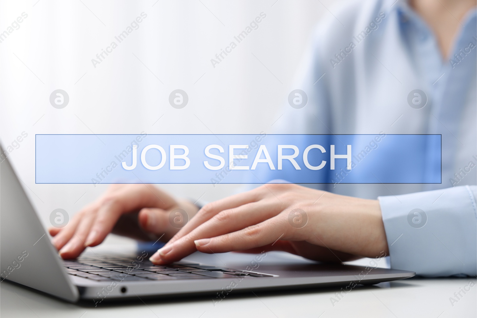 Image of Job Search. Woman using laptop at table, closeup