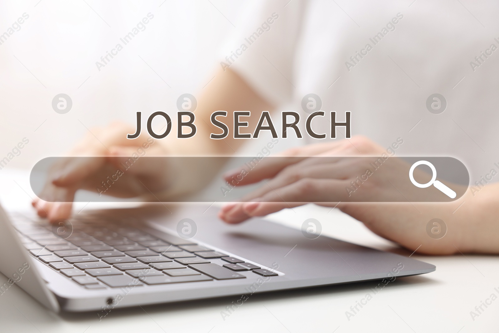 Image of Job Search. Woman using laptop at table, closeup. Search bar