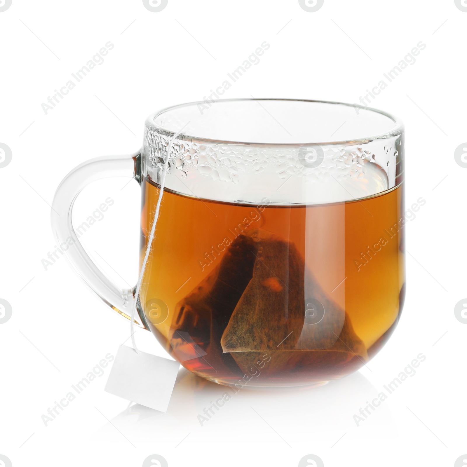 Photo of Cup with tea bag isolated on white