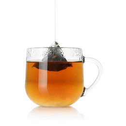 Photo of Cup with tea bag isolated on white