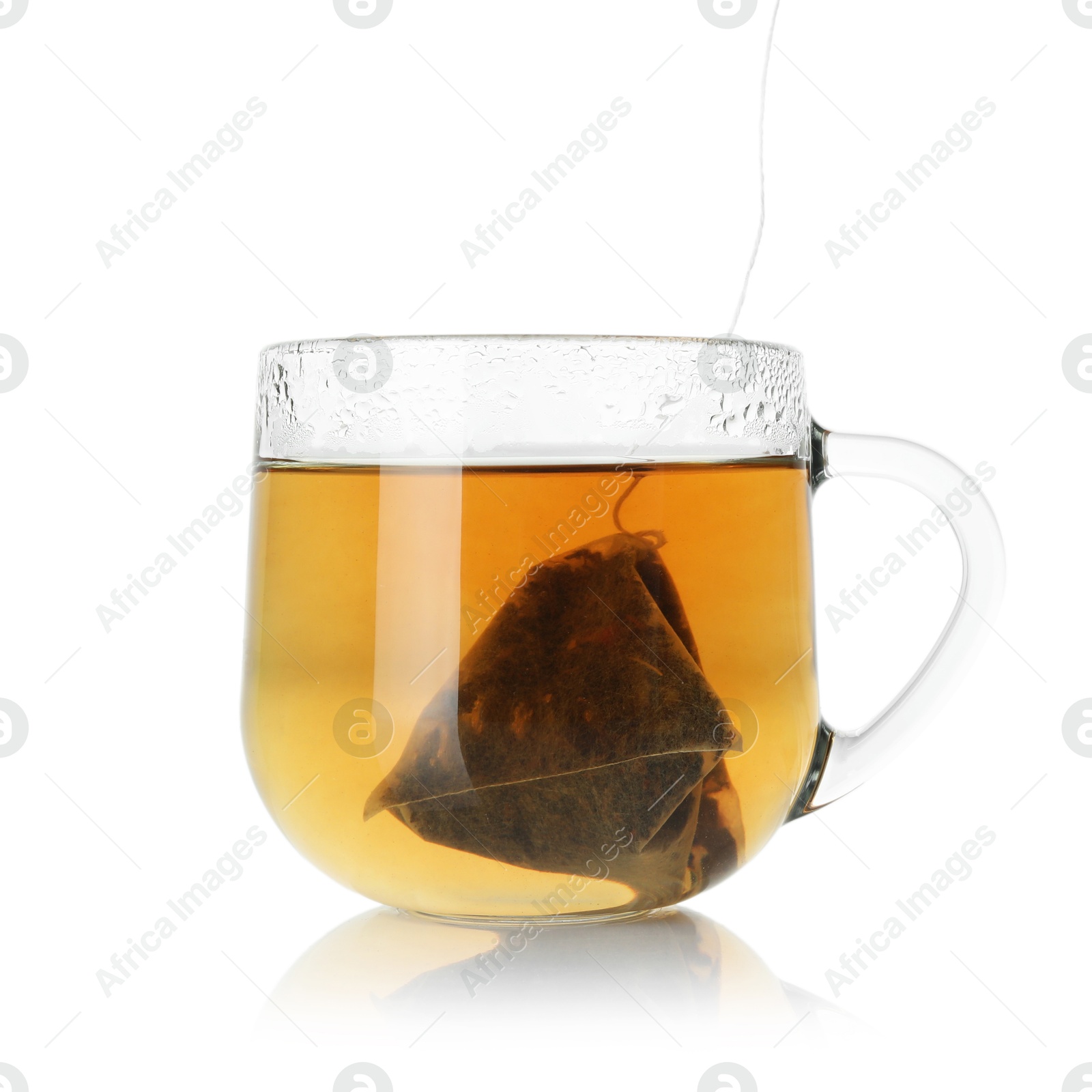 Photo of Cup with tea bag isolated on white