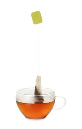 Photo of Cup with tea bag isolated on white