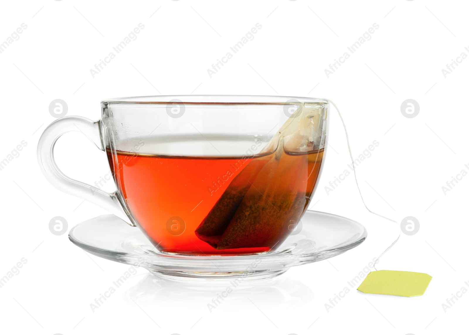 Photo of Cup with teabag isolated on white. Brewing aromatic tea