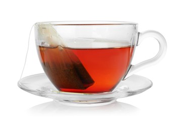 Photo of Cup with teabag isolated on white. Brewing aromatic tea