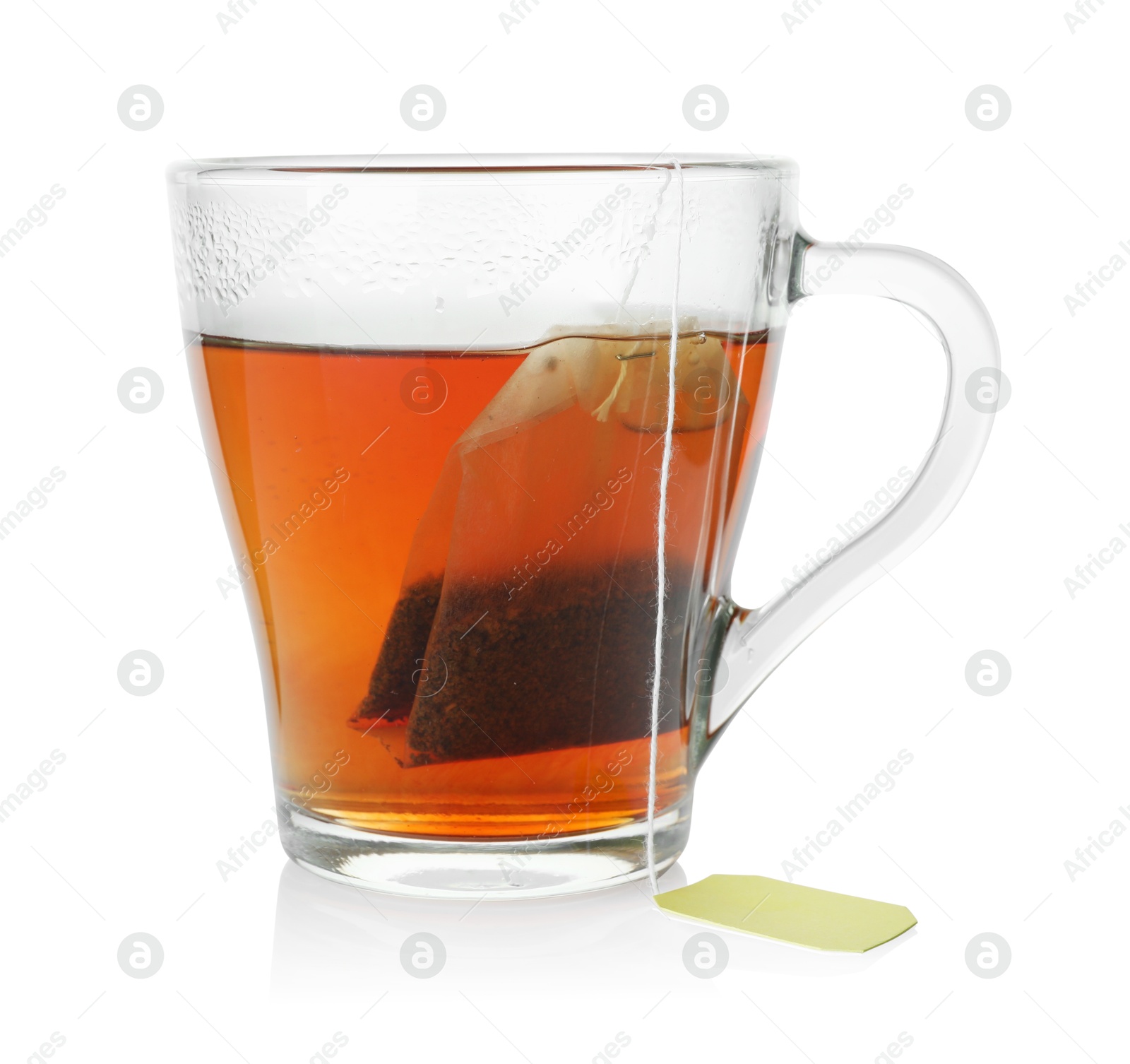 Photo of Cup with teabag isolated on white. Brewing aromatic tea