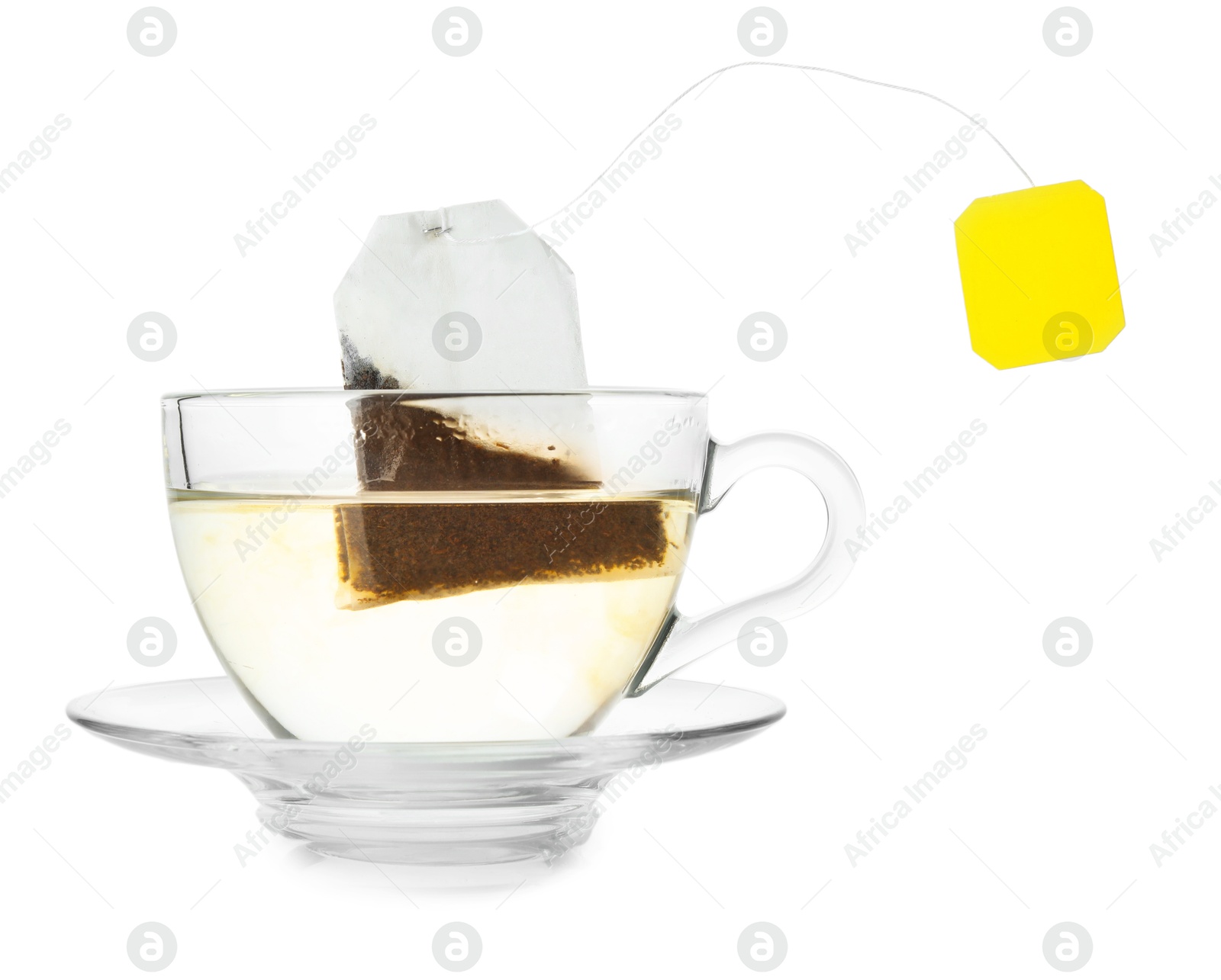 Photo of Brewing aromatic tea. Cup with teabag isolated on white