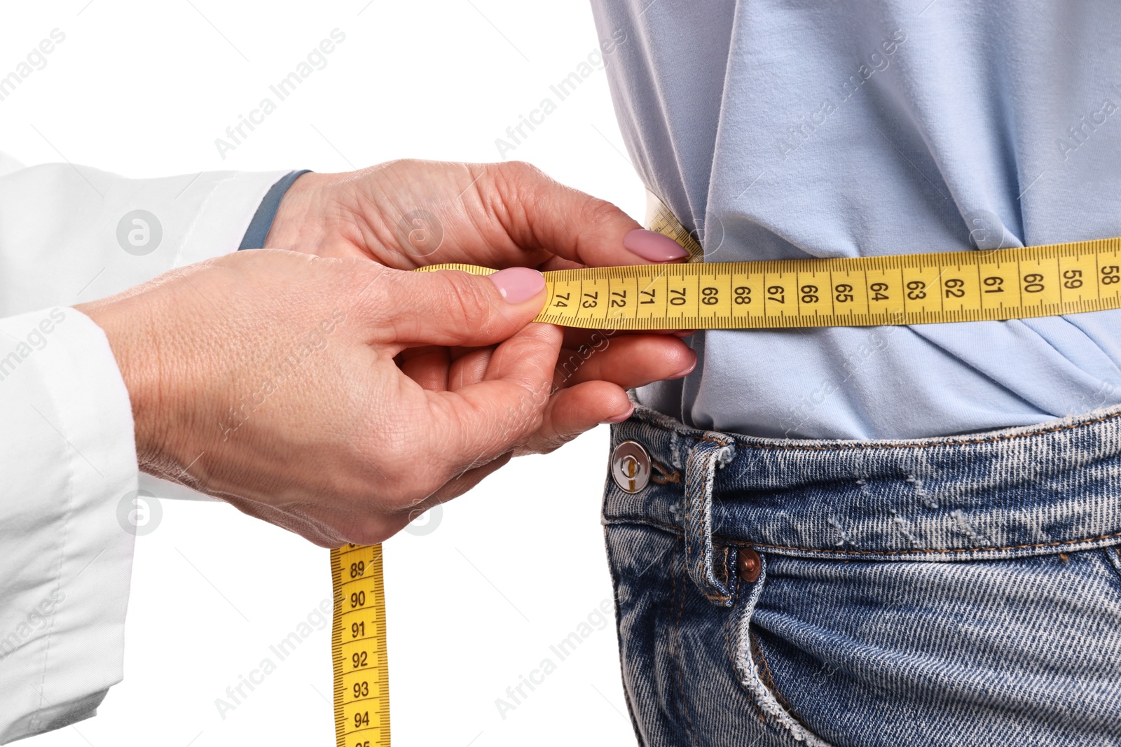 Photo of Weight loss. Nutritionist measuring patient's waist with tape on white background, closeup