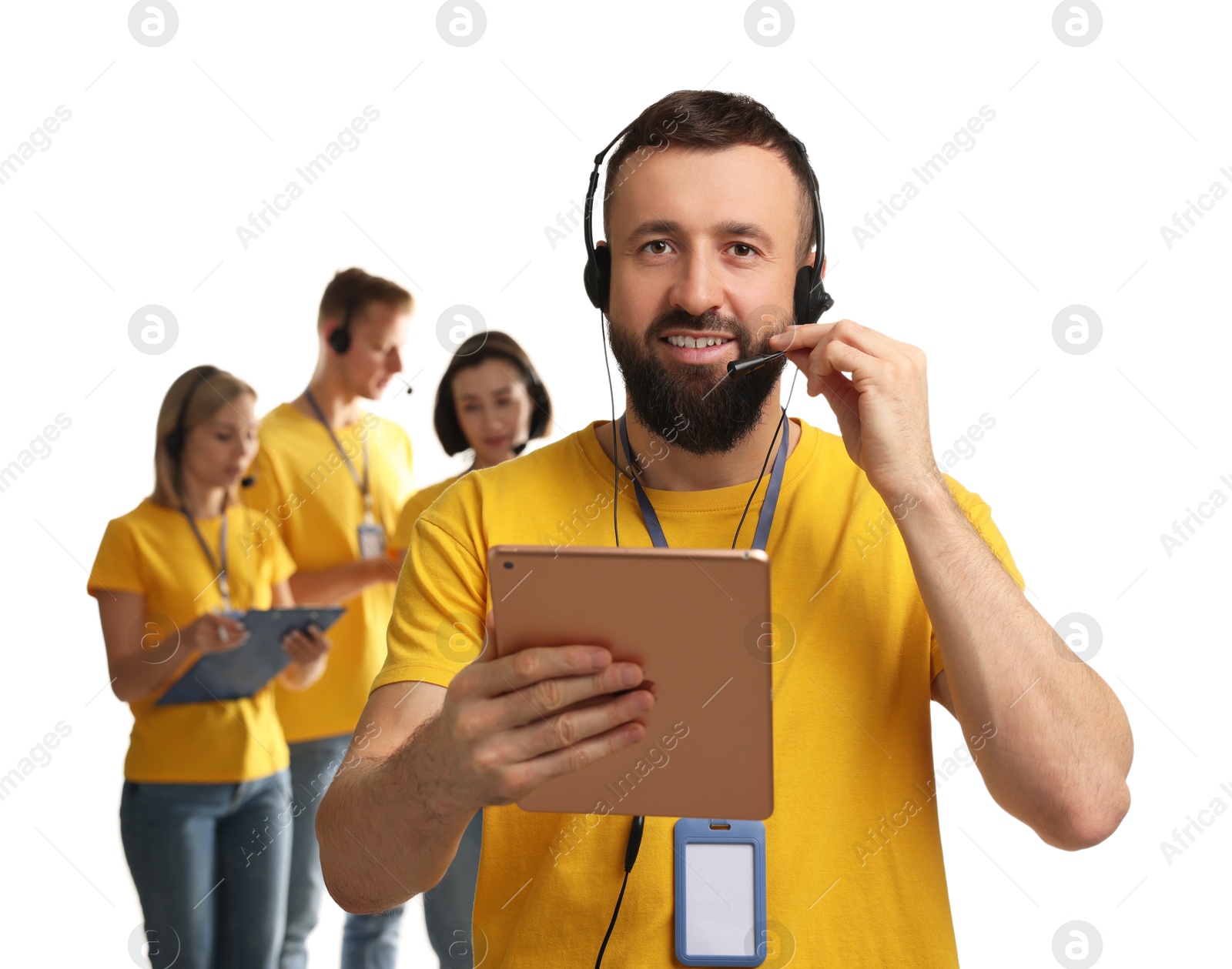 Photo of Technical support call center. Team of friendly operators on white background